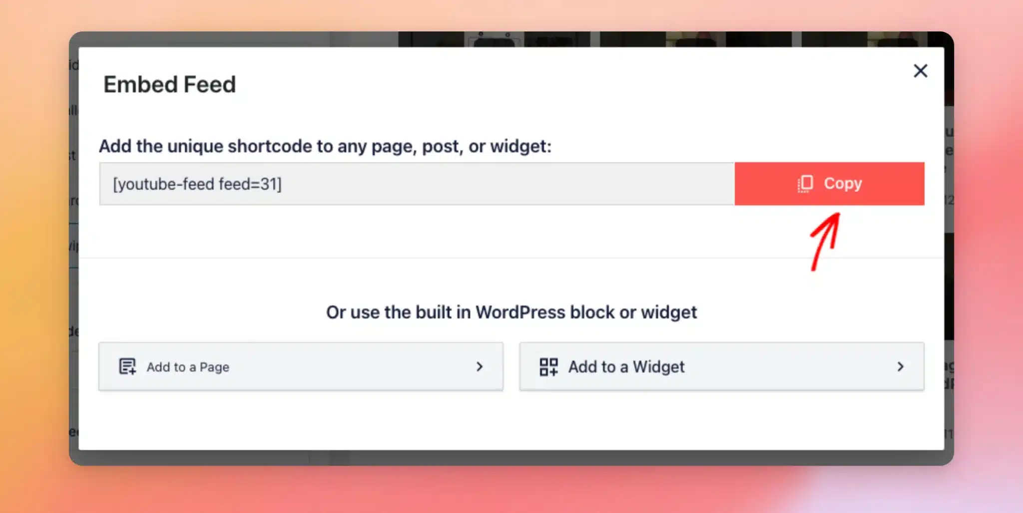 The Embed Feed window with the feed's shortcode and an arrow on the Copy button